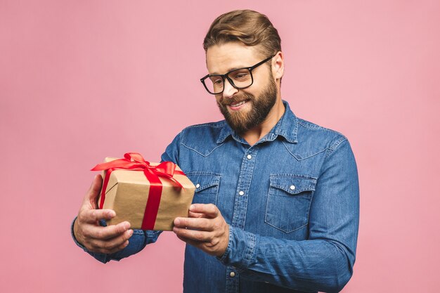 Portrait of a man with a present box