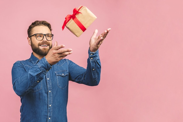 Portrait of a man with a present box