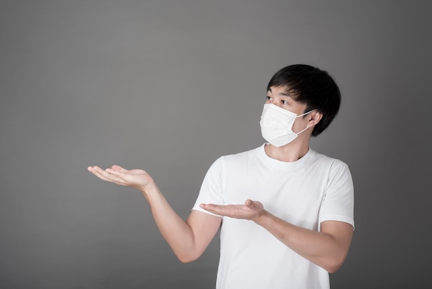 Portrait of  Man with surgical mask , Health care concept