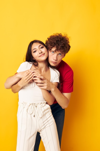 Portrait of a man and a woman together posing emotions closeup isolated background unaltered