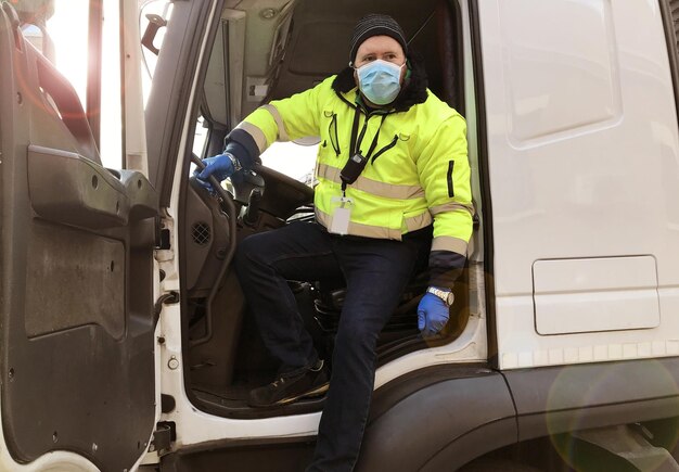 Portrait of man working at bus