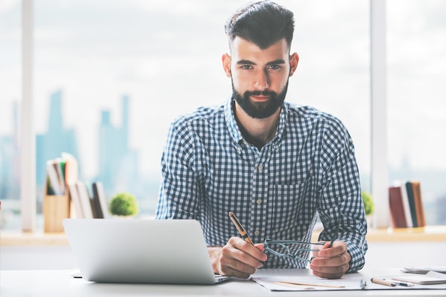 Portrait of man at workplace