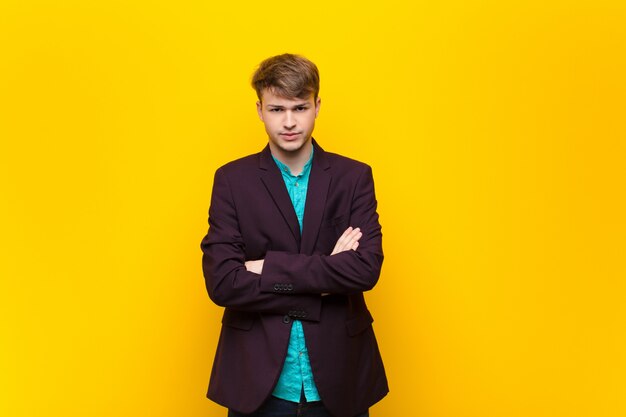 Portrait of a man on a yellow background