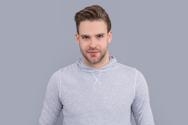 Portrait of man Young man with unshaven face Handsome man studio Caucasian man in casual