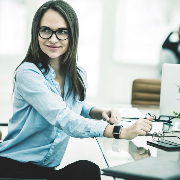 Portrait of Manager Finance in the workplace in a modern office