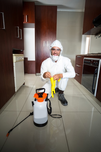 Portrait of manual worker wearing protective gloves