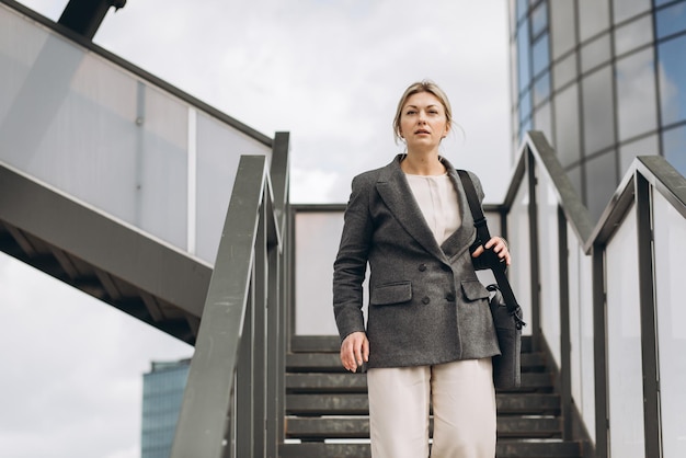 Portrait of a mature business woman on a modern office and urban background