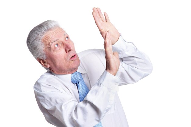 Portrait of a mature businessman isolated on white background