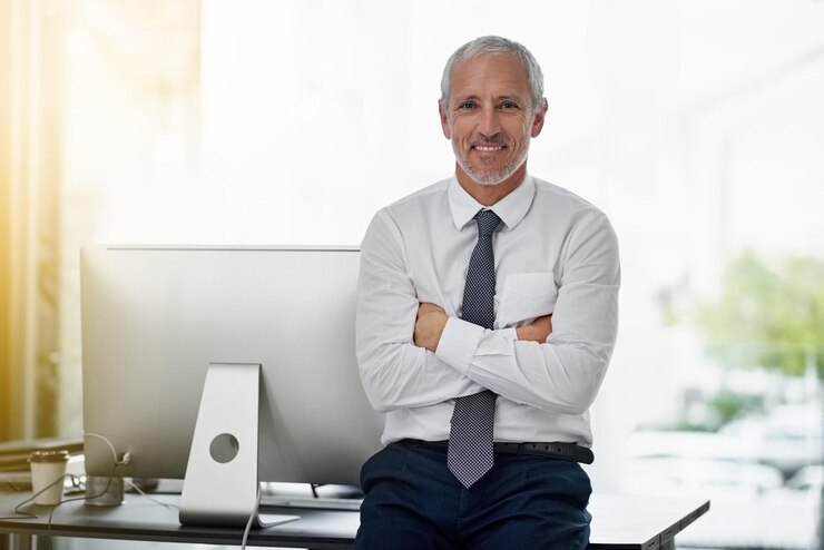 Photo portrait mature businessman and pride in office for startup project corporate experience and happy professional manager male executive and smile in workplace arms crossed and boss in canada
