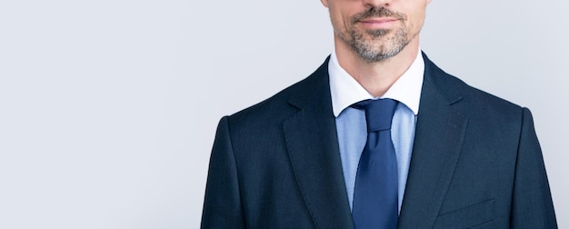 Portrait of mature lawyer wearing glasses and business suit