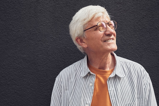 Portrait of Mature Man on Grey