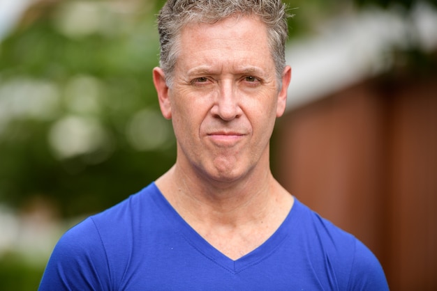 Portrait of mature man in the streets outdoors