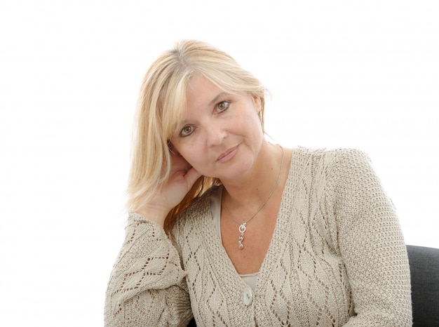 Portrait of mature smiling blond woman