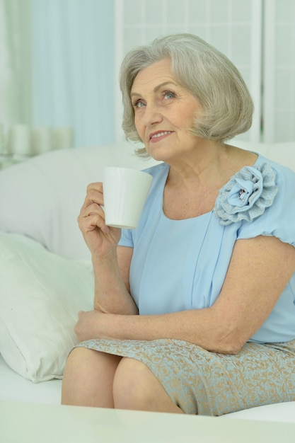 Portrait of a mature woman drinking tea