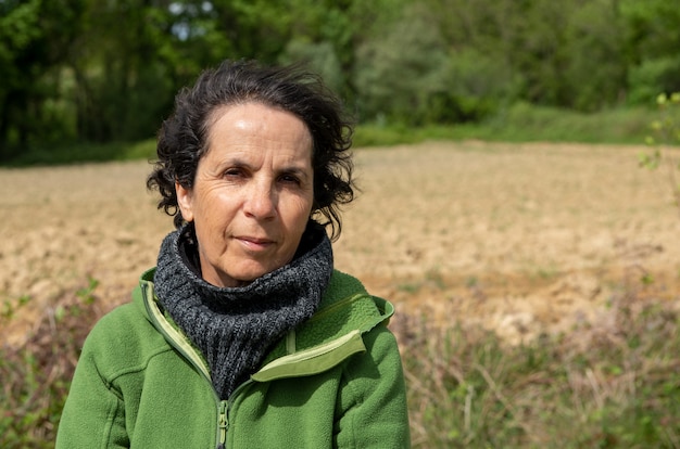 Portrait of mature woman, wind in the hairs