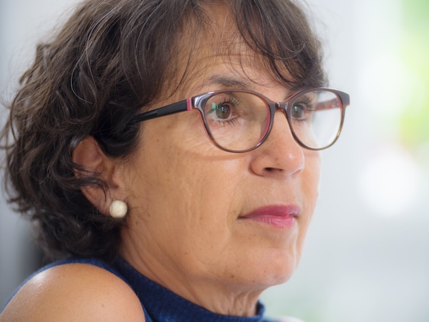 Portrait of a mature woman with glasses