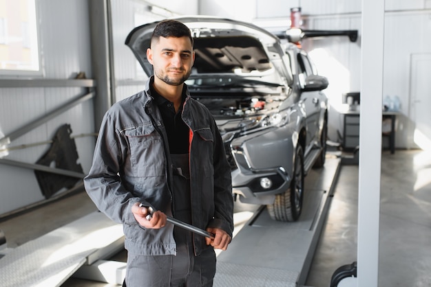 Portrait of a mechanic at work in his garage