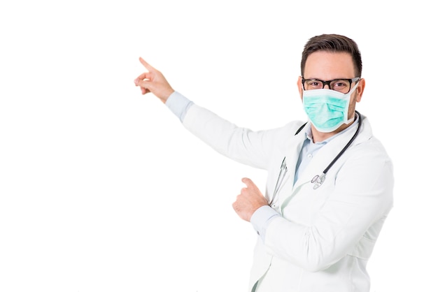 Portrait of medic or doctor with surgical mask on isolated on white background