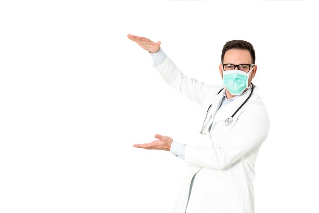 Portrait of medic or doctor with surgical mask on isolated on white background