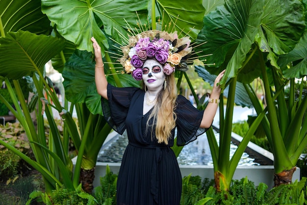 Portrait of Mexican woman made up as a catrina