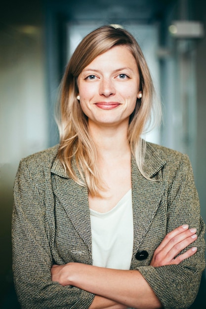 portrait of mid adult woman smiling in office