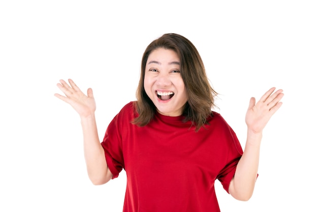 Photo portrait of middle age 40s asian woman raising his arm with a very happy expression on white