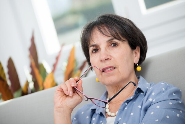  portrait of middle age brunette with glasses