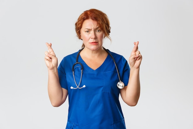 Portrait of middle aged redhead woman posing