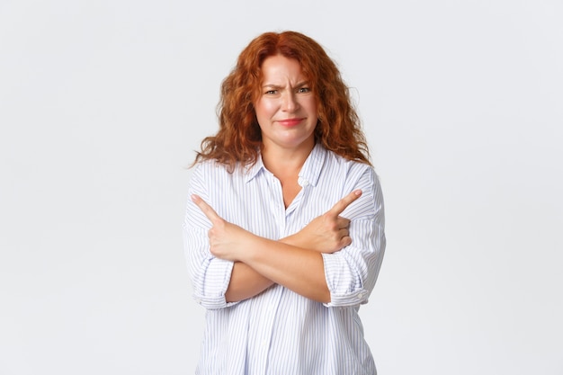 Portrait of middle aged redhead woman posing