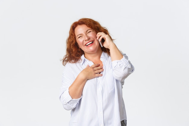 Portrait of middle aged redhead woman posing