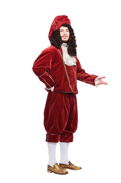 Portrait of the Middle Ages man in red costume isolated on white background