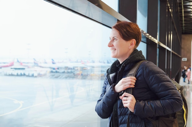 Portrait of middleaged woman talking on mobile phone