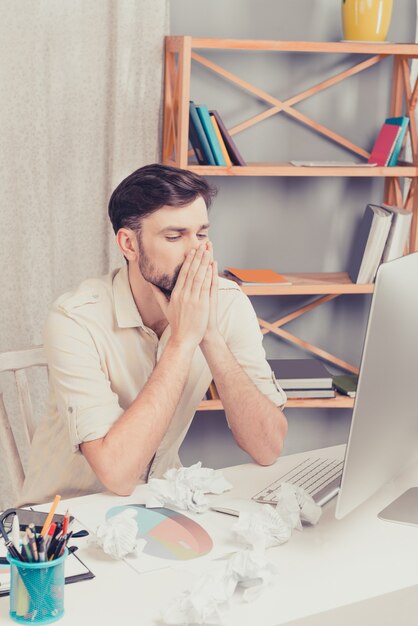 Portrait of minded man thinking about his hard task