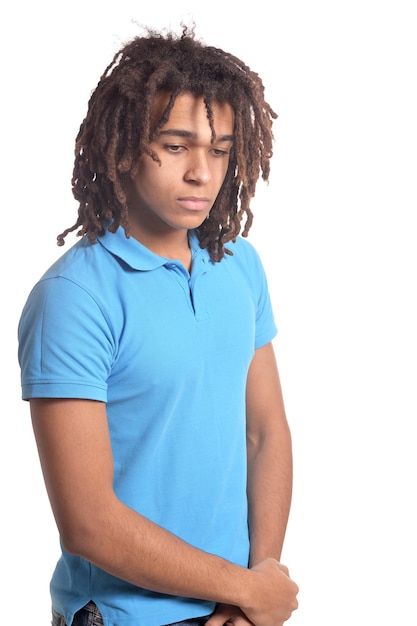 Portrait of mixed race teenage boy isolated on white background