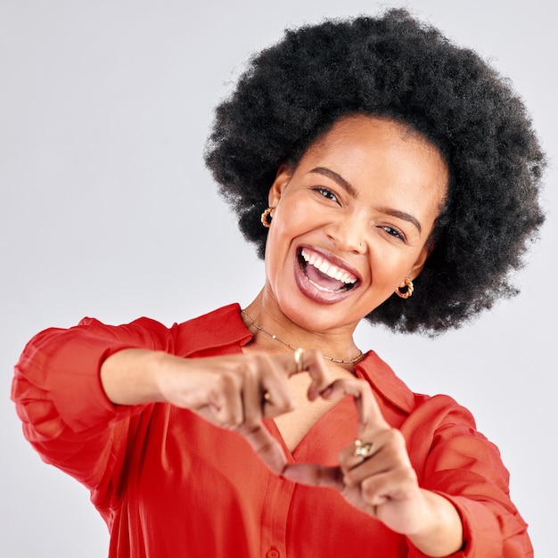 Portrait mockup and black woman with heart hands support and review on a white studio background Face female person and happy model with symbol for love like and emoji with motivation and hope