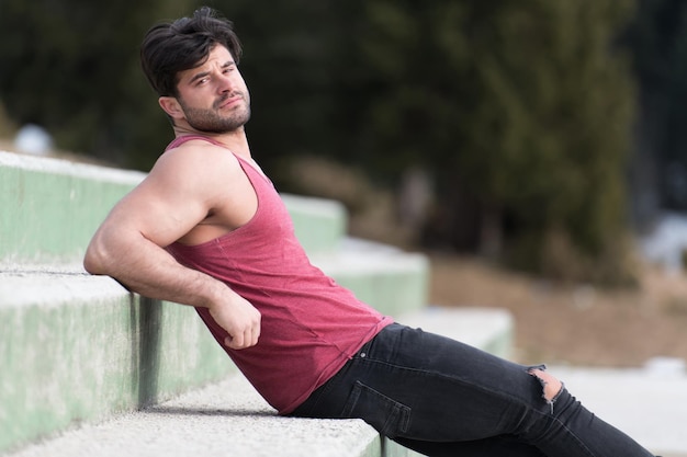 Portrait of a Model Man Standing Outdoors