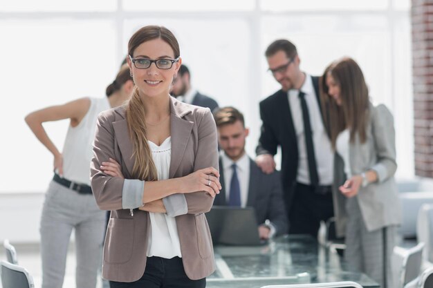 Portrait of modern business woman on office backgroundphoto with copy space