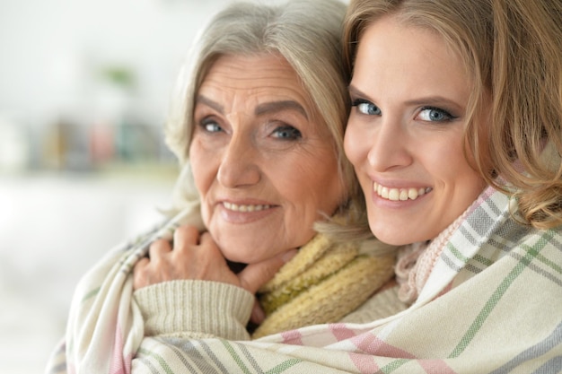 Portrait of mother and daughter, close up