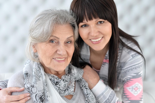 Portrait of mother and daughter, close up