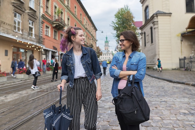 Portrait of mother and daughter of teenager 15 years old