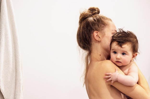 Photo portrait of mother and son against white background