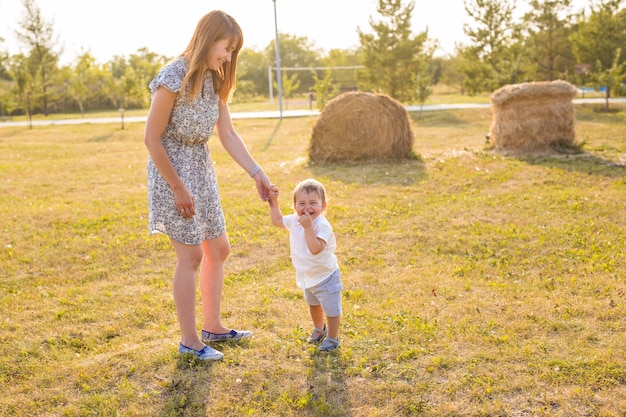 Portrait Of Mother And Son In Park or Countryside