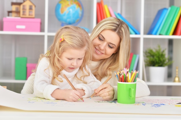 Portrait of a mother with little daughter