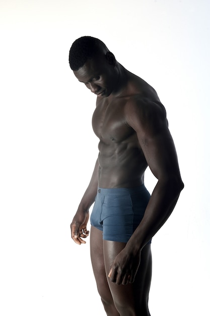 Photo portrait of a muscular man on white background