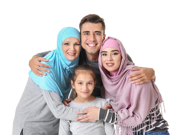 Portrait of Muslim family on white background