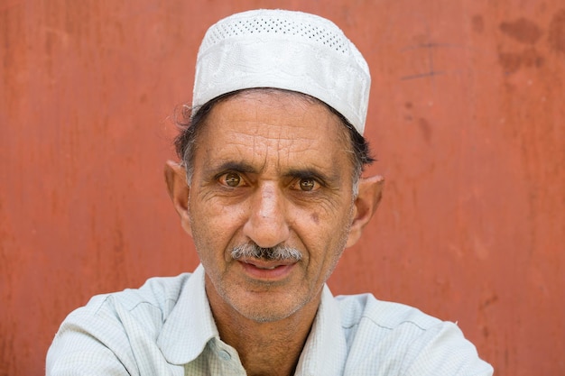 Portrait muslim man in srinagar kashmir india close up