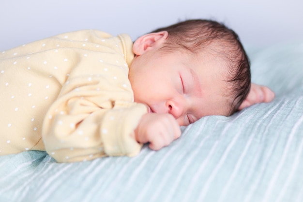 Portrait of a newborn sleeping baby