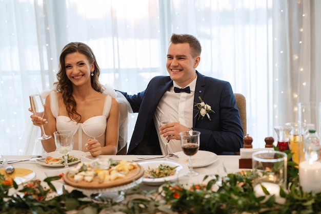 Portrait of the newlyweds at the presidium