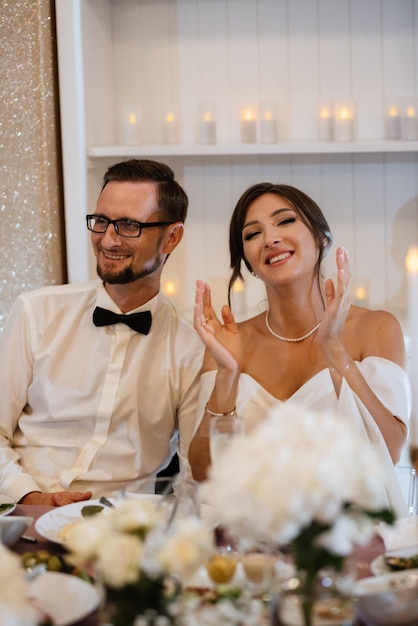 Portrait of the newlyweds at the presidium