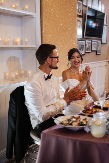 Portrait of the newlyweds at the presidium